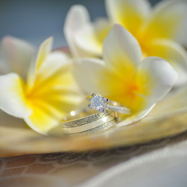 beautiful wedding ring with background yellow flower