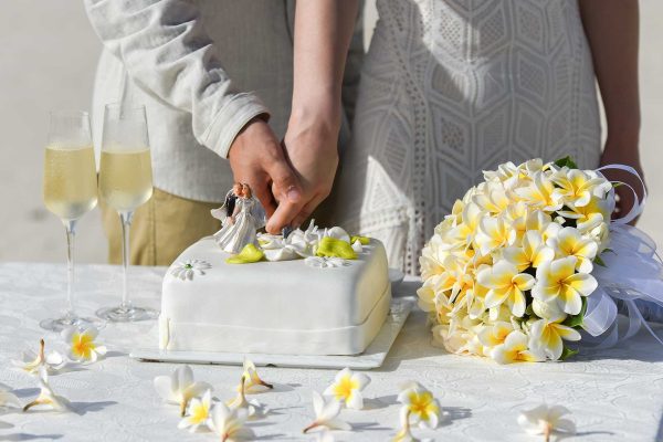 beautiful square wedding cake with yellow flowers