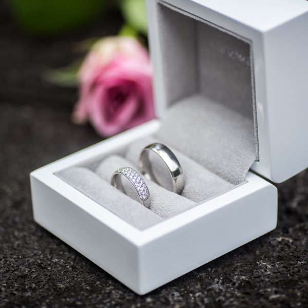 branded wedding rings in a box
