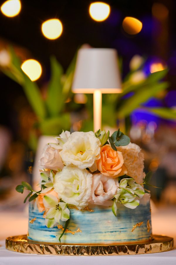 wedding cake with colourful flowers