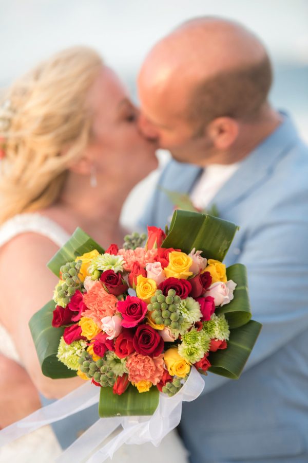 long kiss for the bride and groom after ceremony