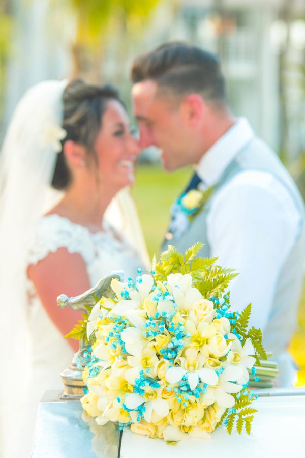 couple smiling to each other for photoshoot